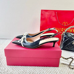 VLTN HIGH SLINGBACK 25S 40 MM IN BLACK LAMBSKIN WITH BOW