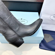 PRADA 25S POINTED-TOE LOW-CUT BOOTS IN BLACK COWHIDE