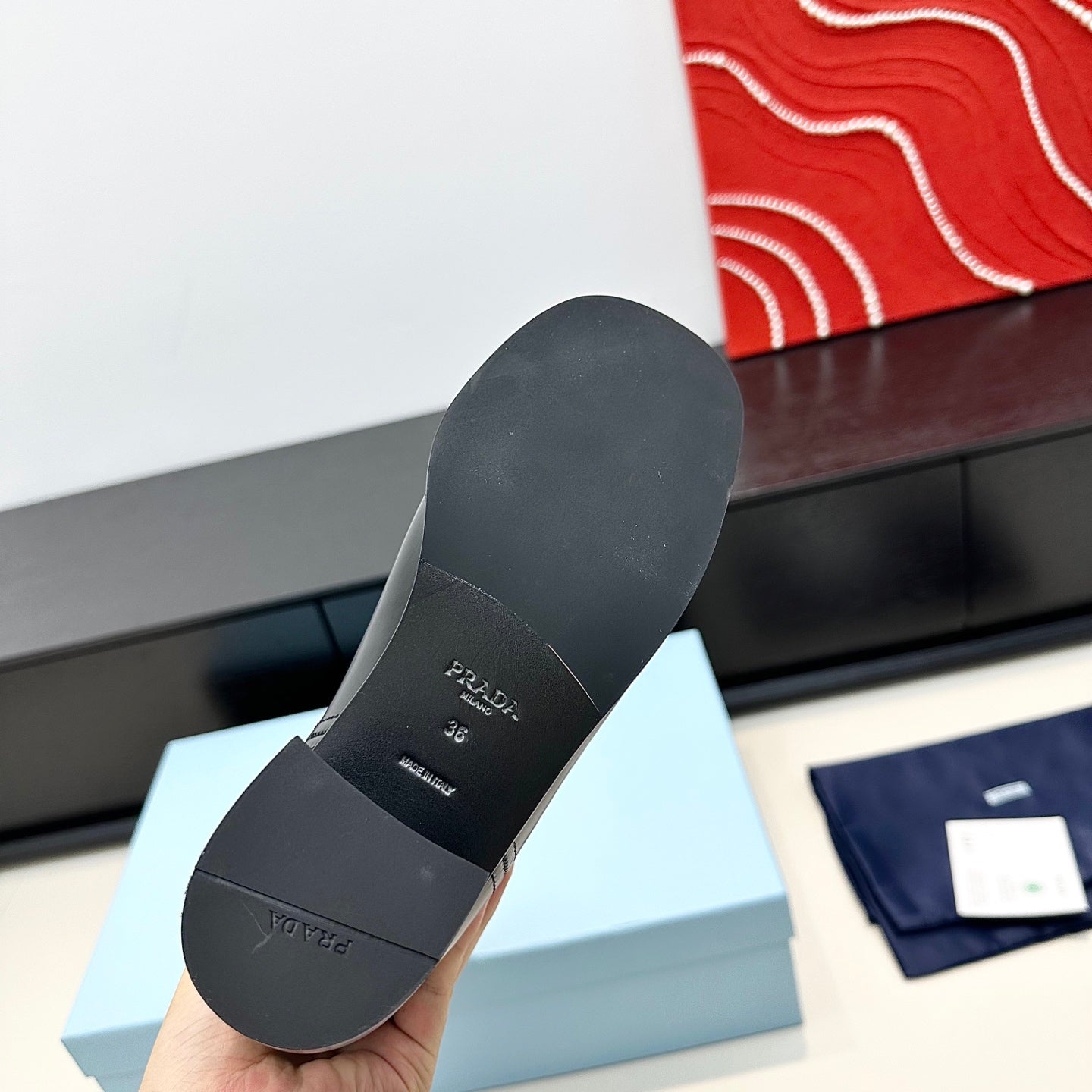 PRADA 25S HIGH-CUT BOOTS 55 MM IN BLACK CALFSKIN