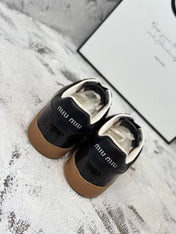 RETRO SNEAKERS IN BLACK LAMBSKIN WITH KNITTED PATTERN