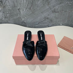 CAP TOE MULES BLACK SHEEPSKIN