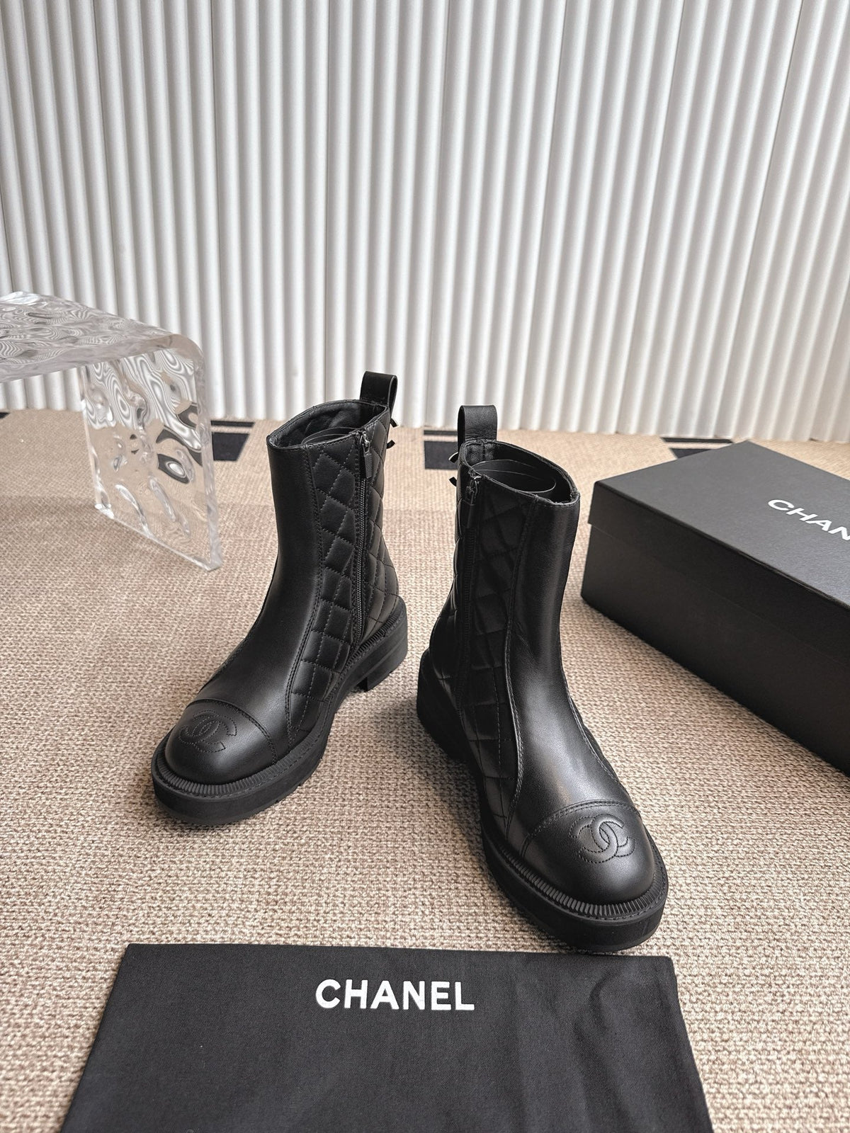 CHANEL ANKLE BOOTS IN BLACK QUILTED CALFSKIN