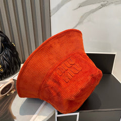 MM BUCKET IN ORANGE VELVET WITH LOGO