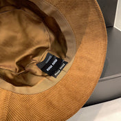 MM BUCKET IN BURNT ORANGE VELVET WITH LOGO