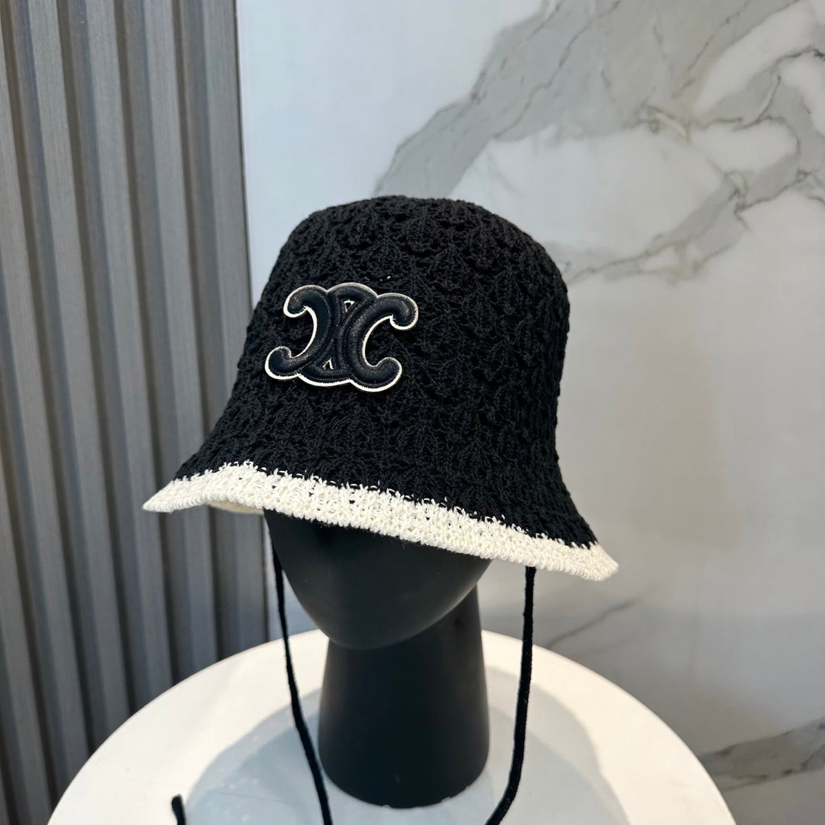 BUCKET HAT MODEL 652271 IN BLACK AND WHITE CROCHET