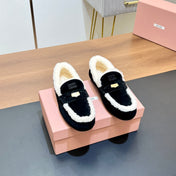 LOAFERS IN BLACK SUEDE AND WHITE SHEARLING TRIM
