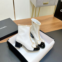 CHANEL 25S HEELED CHAIN BOOTS WITH BOW IN WHITE CALFSKIN GOLD HARDWRE