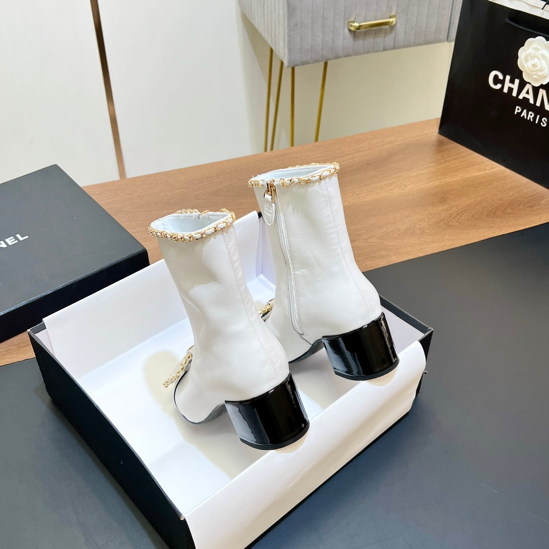 CHANEL 25S HEELED CHAIN BOOTS WITH BOW IN WHITE CALFSKIN GOLD HARDWRE
