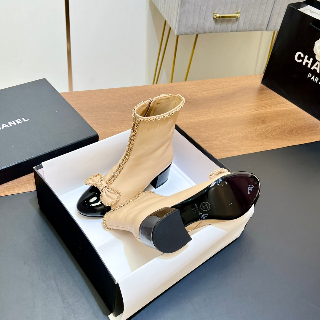 CHANEL 25S HEELED CHAIN BOOTS WITH BOW IN BEIGE CALFSKIN GOLD HARDWRE