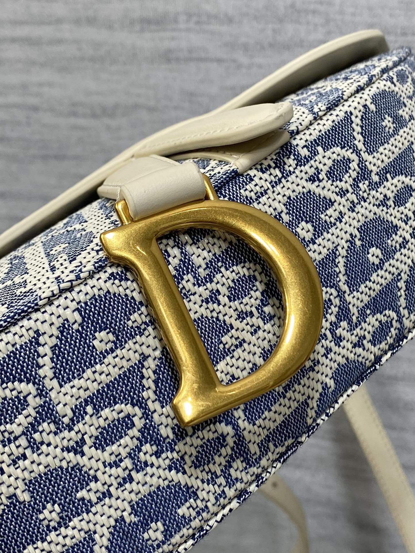 DIOR 25S MINI SOFT SADDLE BAG 19 IN BLUE DIOR OBLIQUE CHAMBRAY AND IVORY SMOOTH CALFSKIN