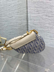 DIOR 25S MINI SOFT SADDLE BAG 19 IN BLUE DIOR OBLIQUE CHAMBRAY AND IVORY SMOOTH CALFSKIN