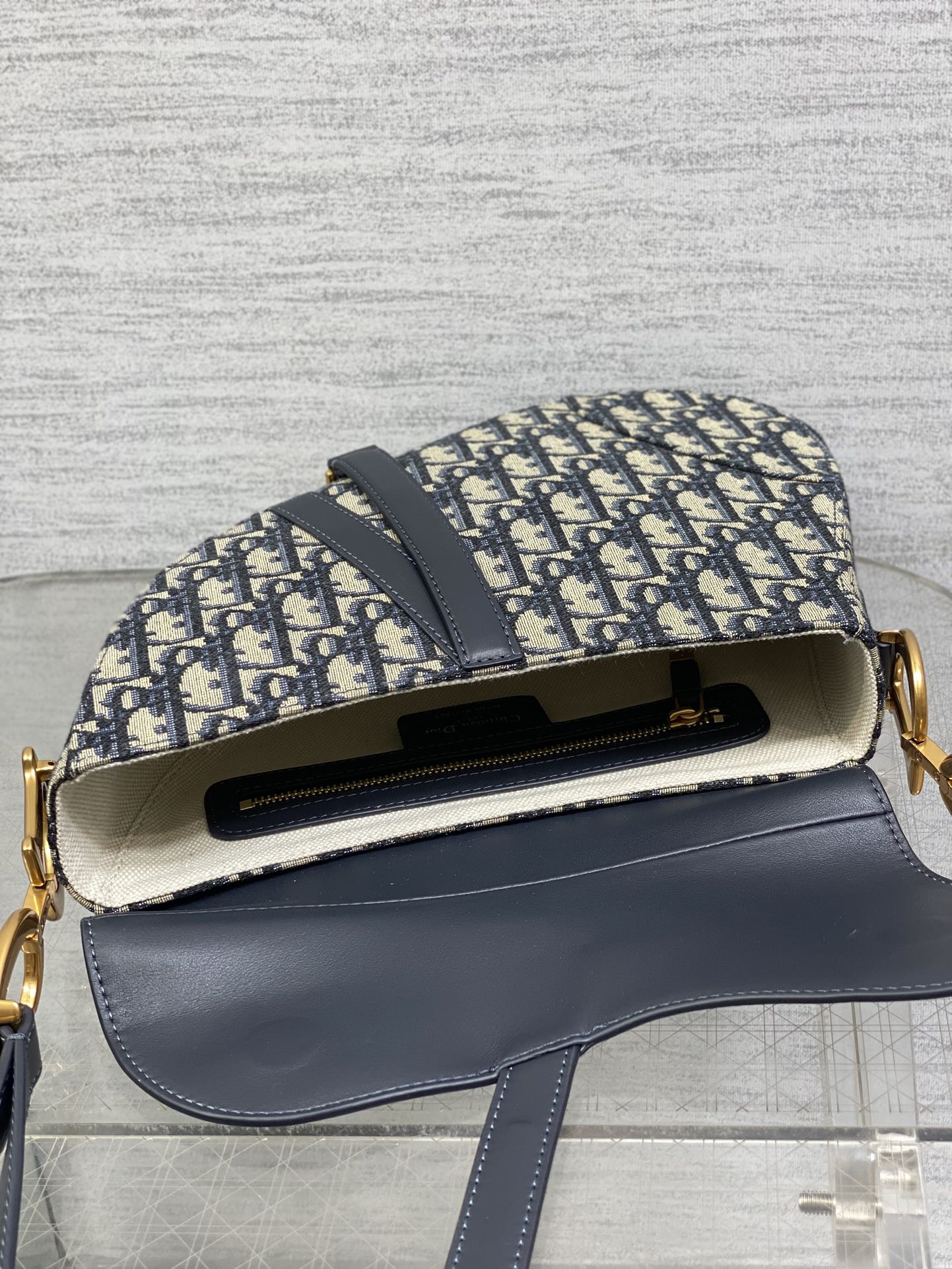 DIOR 25S MINI SOFT SADDLE BAG 19 IN BLUE DIOR OBLIQUE JACQUARD AND SMOOTH CALFSKIN
