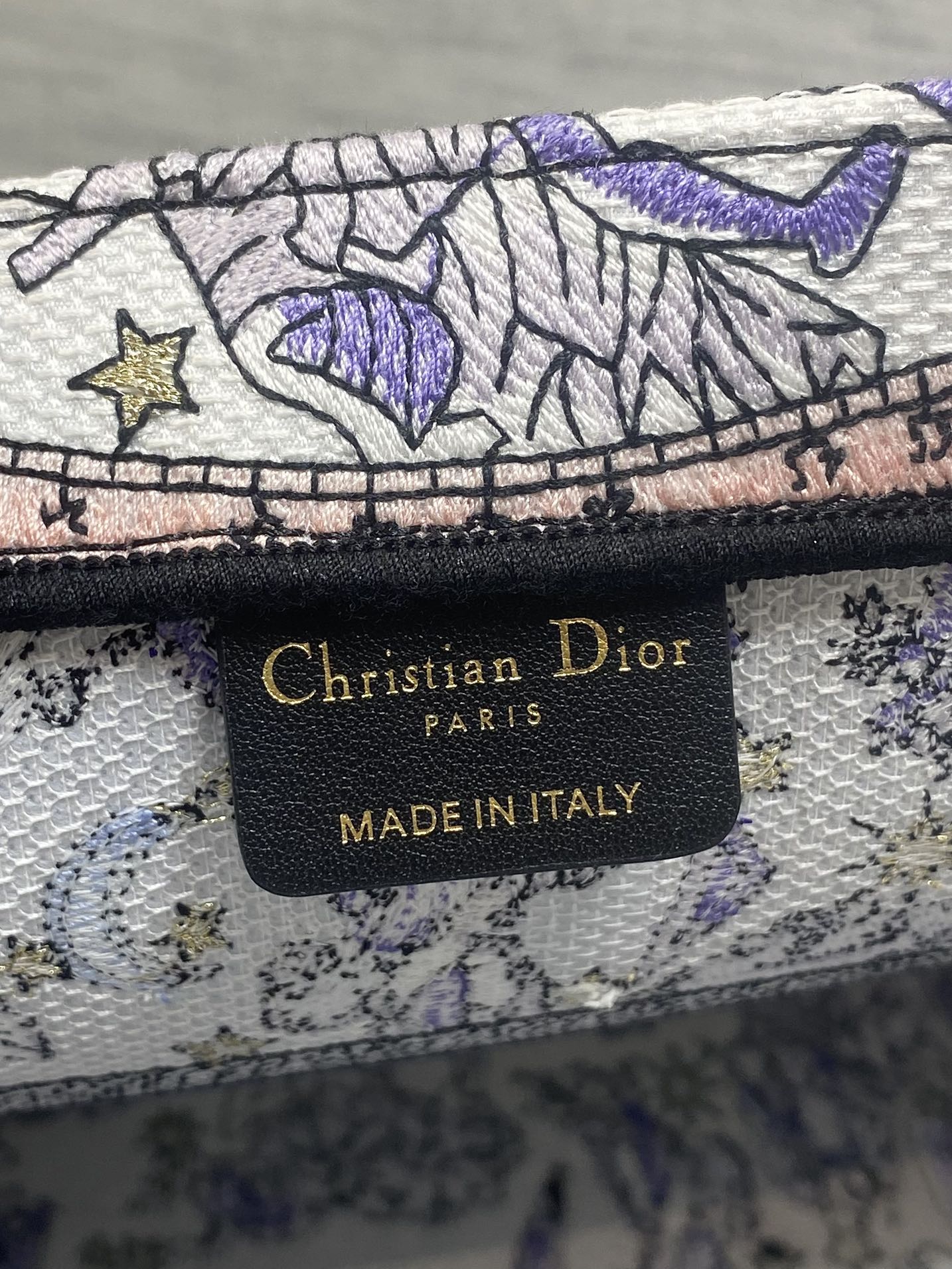 DIOR 25S LUCKY MEDIUM BOOK TOTE 36 IN WHITE AND PURPLE DIOR NIGHT OF DREAMS EMBROIDERY