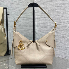DIOR 25S SMALL VOYAGE BAG 23 IN POWDER BEIGE FLAT MACROCANNAGE GRAINED CALFSKIN