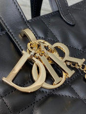 DIOR 25S TOUJOURS VERTICAL TOTE BAG 18 IN BLACK CALFSKIN WITH CHARM BRACELET STRAP