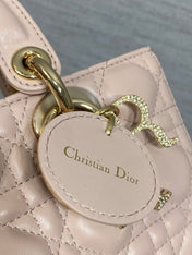 DIOR 25S SMALL LADY D‑JOY BAG 22 IN BABY PINK CALFSKIN GOLD HARDWARE