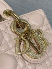 DIOR 25S SMALL LADY D‑JOY BAG 22 IN BABY PINK CALFSKIN GOLD HARDWARE