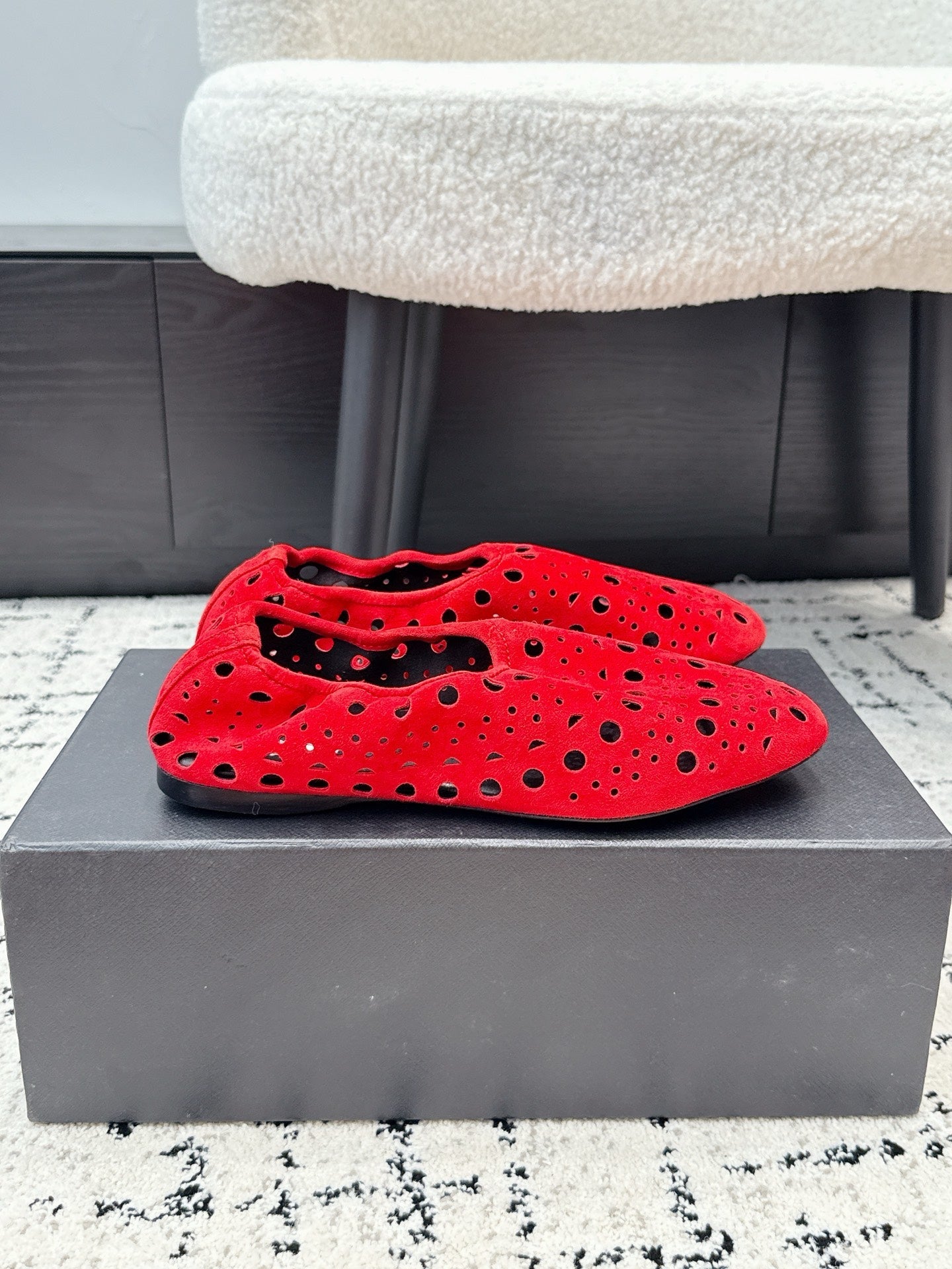 ALAIA 26S FLAT SLIP-ONS IN RED SUEDE WITH OPENWORK PATTERN