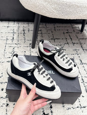 CHANEL 26S LACE-UP SNEAKERS IN WHITE AND BLACK SUEDE STYLE 2