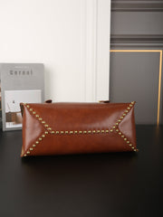 STUDDED BRIEFCASE 34 IN BROWN SHINY SMOOTH CALFSKIN