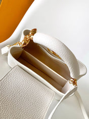 CAPUCINES EAST-WEST MINI 21 IN WHITE TAURILLON LEATHER GOLD-TONE HARDWARE