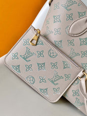 BLOSSOM 20 IN LIGHT BEIGE MAHINA CALFSKIN