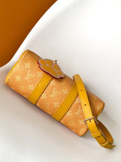 KEEPALL BANDOULIÈRE 25 IN ORANGE MONOGRAM HERITAGE CANVAS