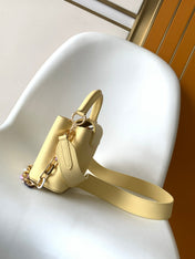 LV 25S CAPUCINES BAG 21 IN YELLOW CALFSKIN GOLD HARDWARE
