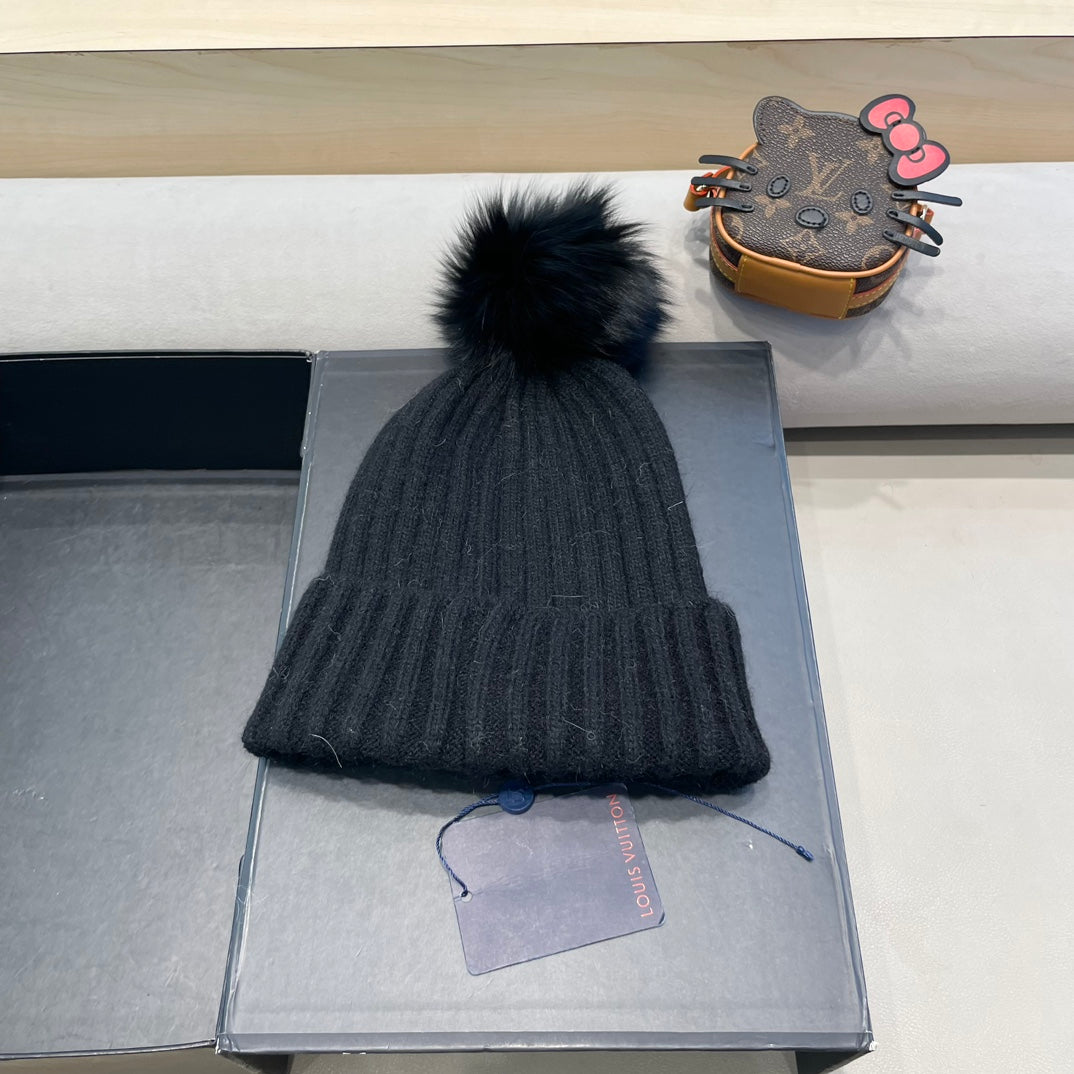 KNITTED BEANIE HAT IN BLACK WOOL 413369