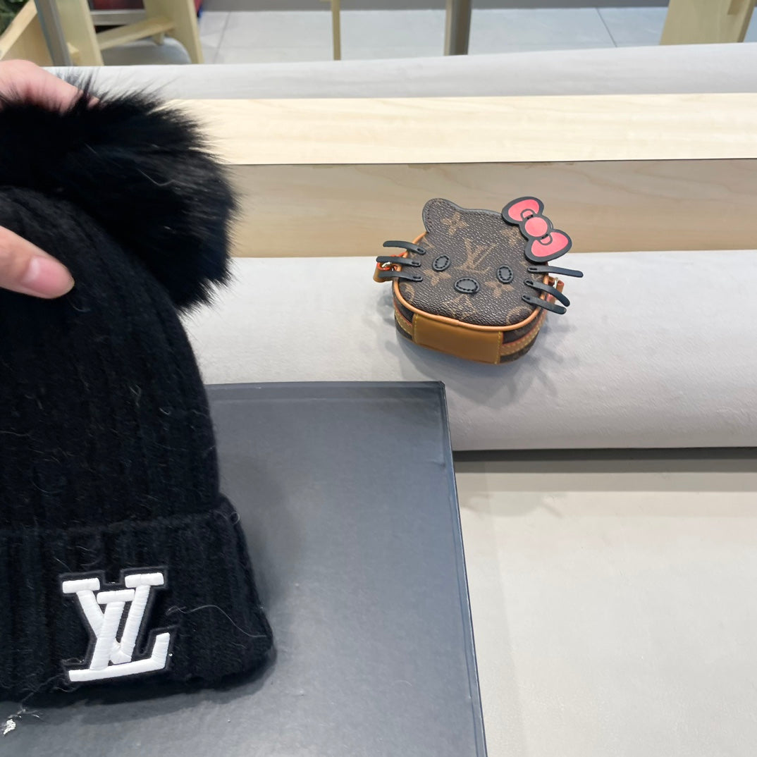 KNITTED BEANIE HAT IN BLACK WOOL 413369