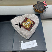 BEANIE HAT IN CAMEL BEIGE WOOL WITH BOW 421255