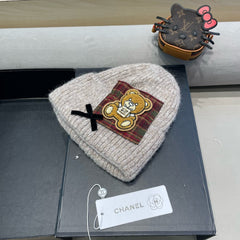 BEANIE HAT IN CAMEL BEIGE WOOL WITH BOW 421255