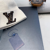 KNITTED BEANIE HAT IN BEIGE FLEECE AND WOOL 426207