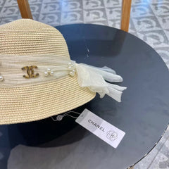 STRAW HAT BOW WITH PEARL IVORY 672698