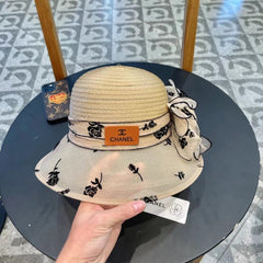 STRAW HAT WITH CHIFFON FLOWER BEIGE 672761
