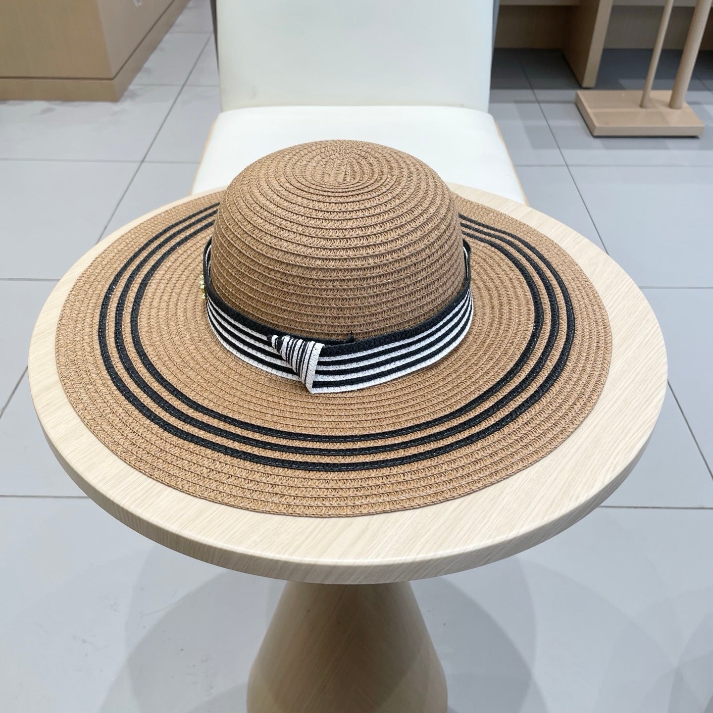 WIDE BRIM HAT MODEL 650410 IN BROWN WITH BLACK STRIPES WOVEN STRAW