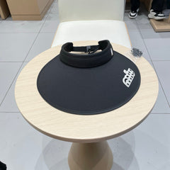 MM FASHION VISOR CAP IN BLACK AND WHITE WITH LOGO TEXT EMBROIDERY