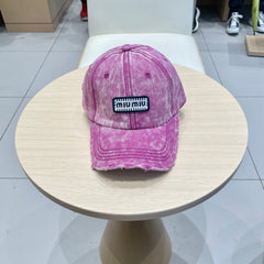 MM DISTRESSED FABRIC BASEBALL CAP IN PINK WITH EMBROIDERED LOGO