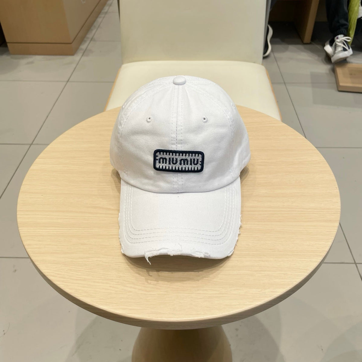 MM DISTRESSED FABRIC BASEBALL CAP IN WHITE WITH EMBROIDERED LOGO