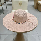 WIDE BRIM HAT MODEL 652184 IN LIGHT PINK WOVEN STRAW