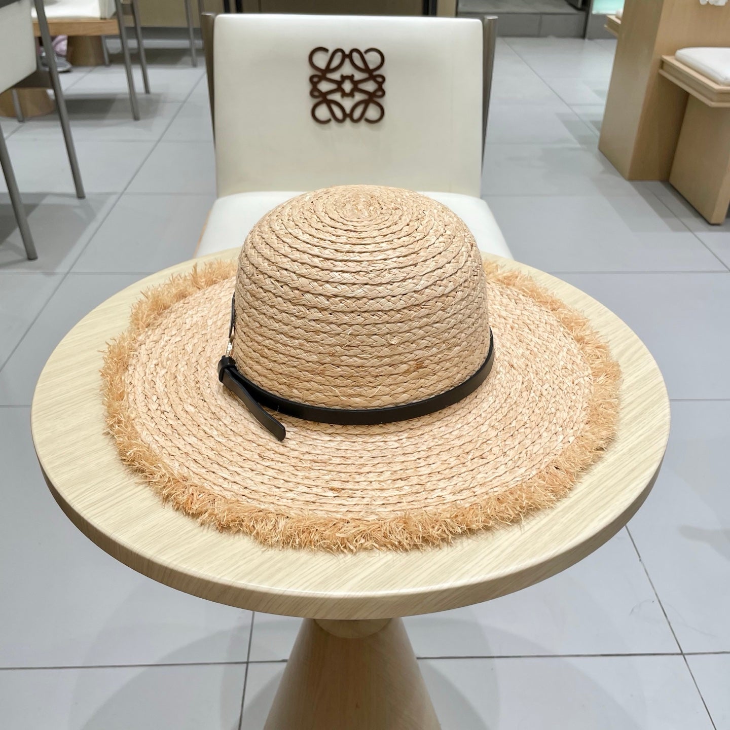 WIDE BRIM HAT MODEL 650422 IN NATURAL WITH BLACK LEATHER STRAP RAFFIA STRAW