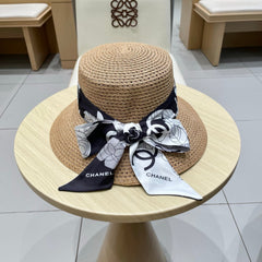 NATURAL STRAW BUCKET HAT WITH RIBBON 672773