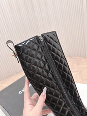 CHANEL KNEE-HIGH BOOTS 25S IN BLACK GLOSSY LAMBSKIN