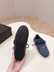PRADA 26S LACE UP MINIMAL SNEAKERS IN NAVY BLUE CANVAS