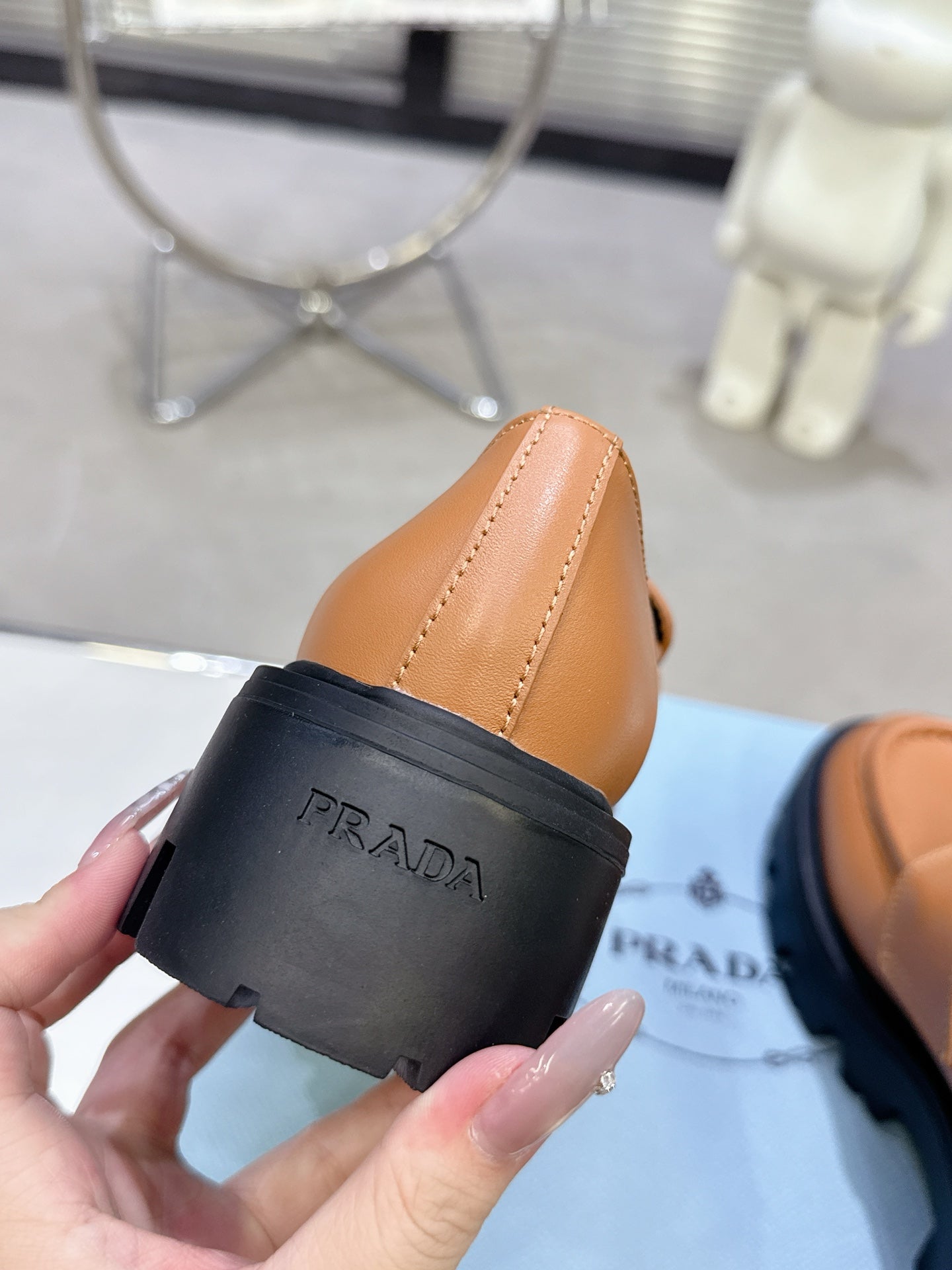 PRADA 25S THICK-SOLE LOAFERS 60 MM IN COGNAC BROWN CALFSKIN