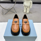 PRADA 25S THICK-SOLE LOAFERS 60 MM IN COGNAC BROWN CALFSKIN