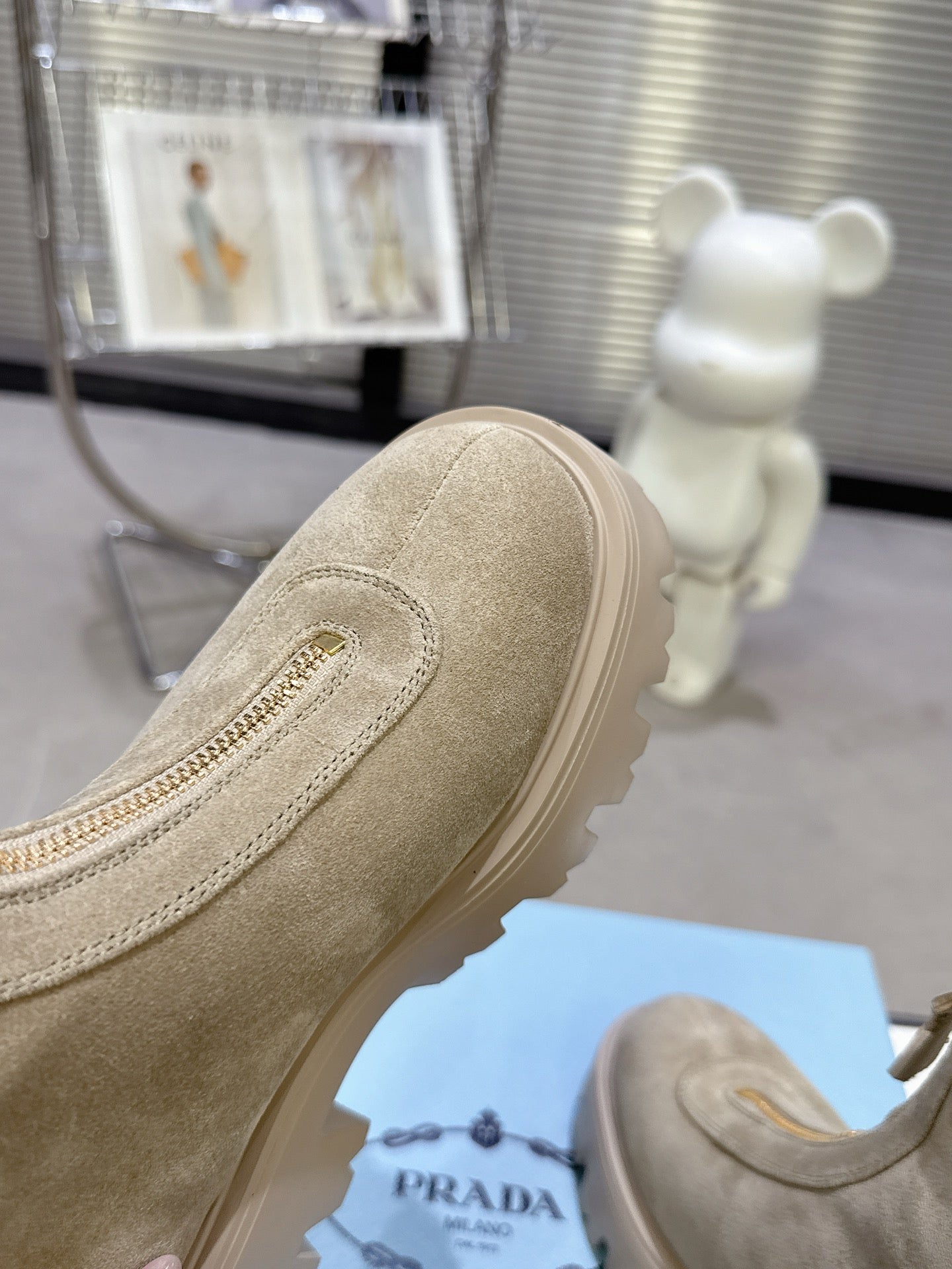 PRADA 25S ZIP-UP ANKLE BOOTS IN BEIGE SUEDE