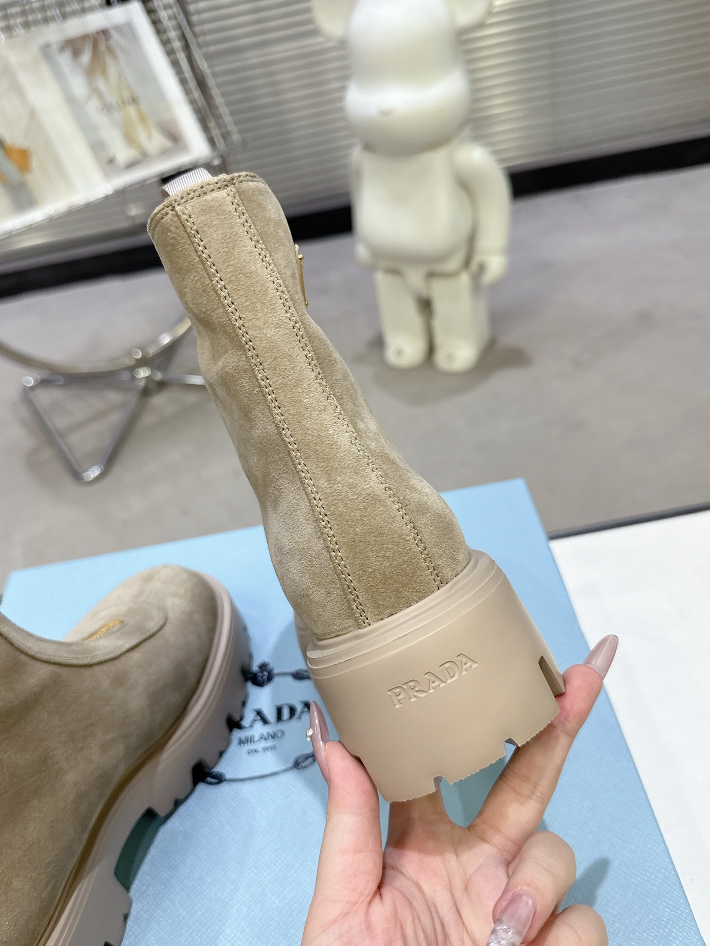 PRADA 25S ZIP-UP ANKLE BOOTS IN BEIGE SUEDE