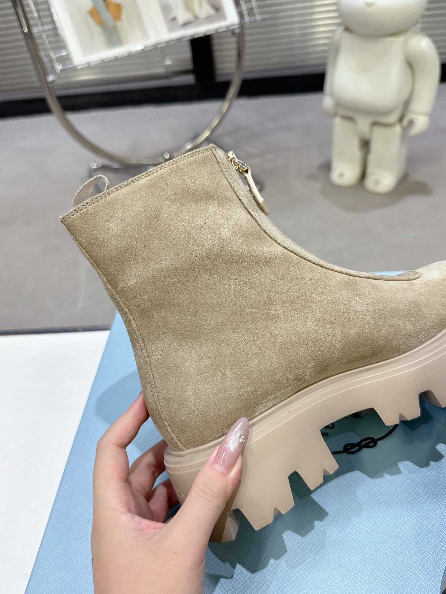 PRADA 25S ZIP-UP ANKLE BOOTS IN BEIGE SUEDE