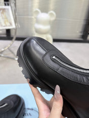 PRADA 25S ZIP-UP ANKLE BOOTS IN BLACK CALFSKIN